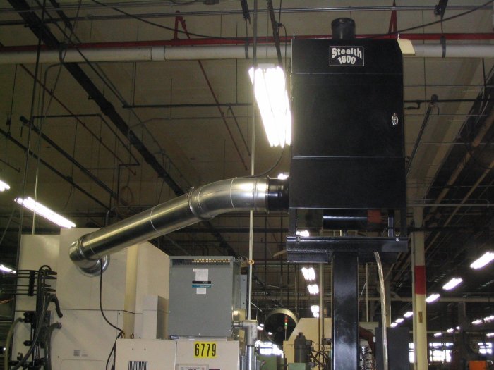ST-1600HP collects 
mist from a Mitsubishi CNC